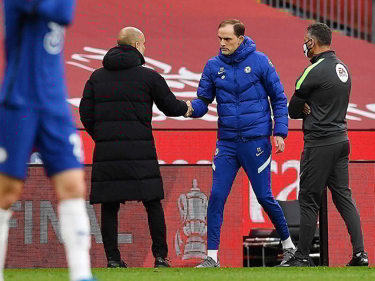Manchester City's Pep Guardiola and Chelsea's Thomas Tuchel shake hands after the FA Cup semifinal.