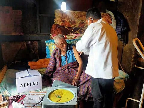 An undated photo provided by the Bhutan Ministry of Health shows a Buddhist ritual performed as vaccines for COVID-19 arrive in Lhuntse, Bhutan. The Himalayan nation has given more than 60 per cent of its people a jab. Some villages were reached by helicopter, and health workers hiked through ice and snow. 