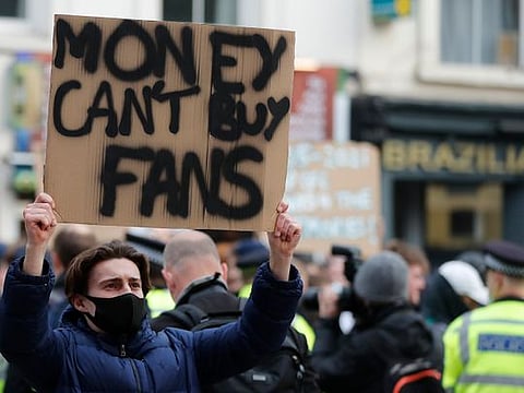 Chelsea fans protest against Chelsea's decision to be included amongst the clubs attempting to form a new European Super League.