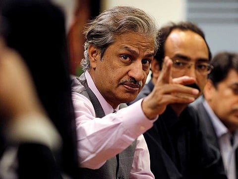 Absar Alam, then Chairman of the Pakistan Electronic Media Regulatory Authority (PEMRA), attends a planning meeting with senior staff in Islamabad, Pakistan, June 1, 2016. 