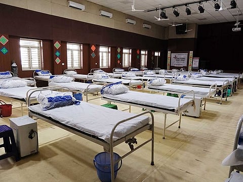 Lines of beds at a makeshift COVID-19 quarantine facility set up at the Sarvodya Bal Vidalya Rose Avenue school in New Delhi, India, on Tuesday, April 20, 2021. 