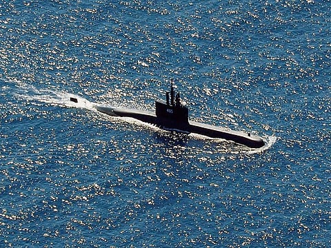Indonesian Navy submarine KRI Alugoro sails during a search for KRI Nanggala, another submarine that went missing while participating in a training exercise on Wednesday, in the waters off Bali Island, Indonesia, Thursday, April 22, 2021. 