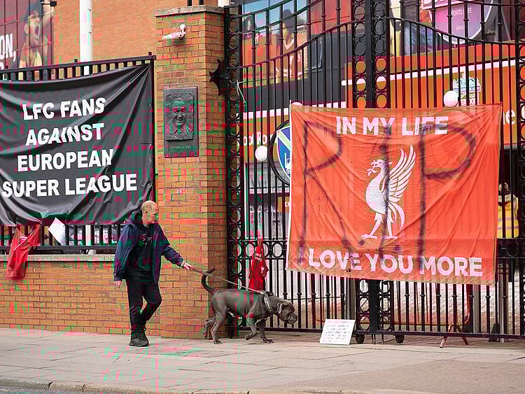 Banners are seen outside Liverpool's Anfield Stadium after the collapse of English involvement in the proposed European Super League