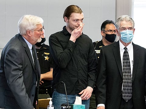 Edward "Jake" Wagner wipes tears away after apologizing to the Rhoden family during his plea hearing at the Pike County Courthouse, Thursday, April 22, 2021 in Pike County, Ohio.