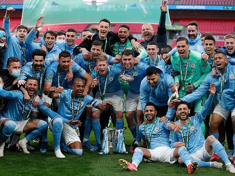 Manchester City celebrate four League Cups in a row