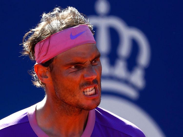Rafael Nadal of Spain reacts after beating Pablo Carreno Busta in Barcelona