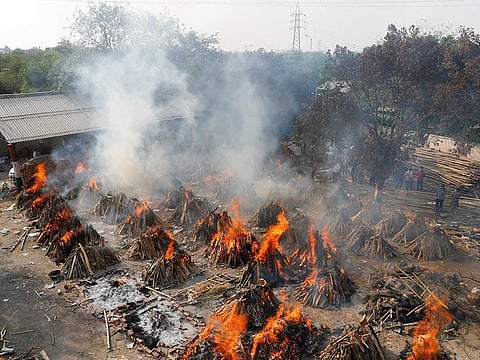 A general view of the mass cremation of those who died from the coronavirus disease (COVID-19) at a crematorium in New Delhi, India April 26, 2021. 