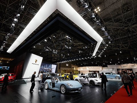 Cars on display at the Porsche stand during Tokyo motor show 2017.