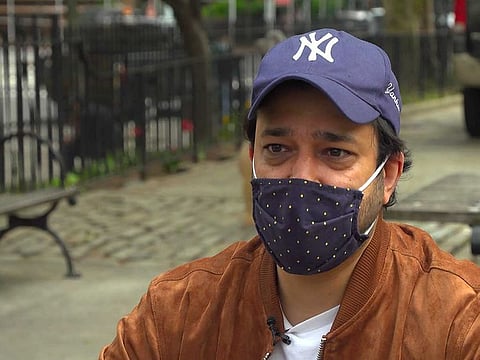 Ankur Chandra, 38, talks about his father's experience with COVID-19, during an interview Tuesday, April 27, 2021, in New York. The New York-based consultant's father is now recovering from COVID-19, alone in an apartment in India’s national capital region of Gurugram. 