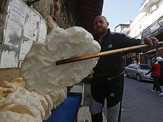 In photos: In Damascus, crispy pastry sweetens frugal Ramadan