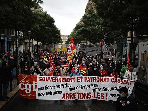 Workers of the leftist union CGT (General Work Confederation) demonstrate on May Day in Marseille, southern France, Saturday, May 1, 2021. 
