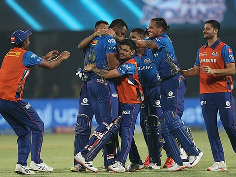 Mumbai Indians players celebrate the victory against Chennai Super Kings in IPL 2021. 