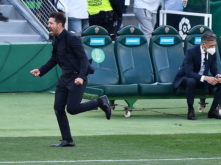 Atletico Madrid coach Diego Simeone celebrates.