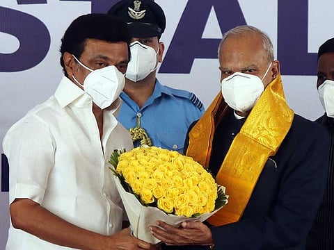 DMK Chief MK Stalin felicitates Governor Banwarilal Purohit during his oath ceremony as the Chief Minister of Tamil Nadu, at Raj Bhavan in Chennai on Friday, May 7, 2021.