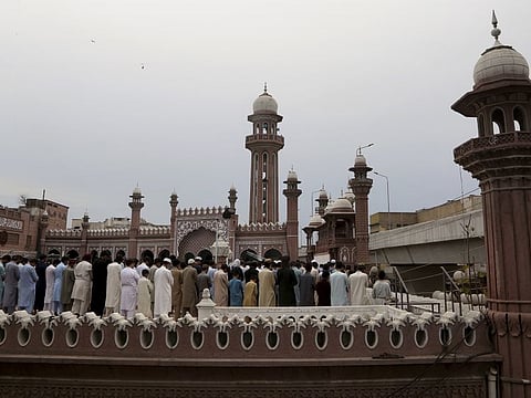 Muslims perform last Friday prayer during the holy fasting month of Ramadan, at the rooftop of a mosque, in Peshawar, Pakistan, Friday, May 7, 2021. 