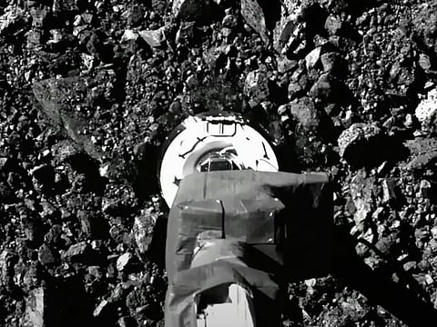 The Osiris-Rex spacecraft touches the surface of asteroid Bennu on Tuesday, Oct. 20, 2020