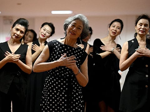Members of the "Fashion Grandmas" during a rehearsal for a performance on a television show in Beijing