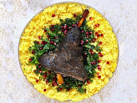 Omanis make Shuwa with lamb, camel or goat meat