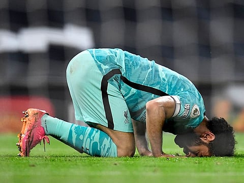 Liverpool's Mohamed Salah celebrates scoring their fourth goal.