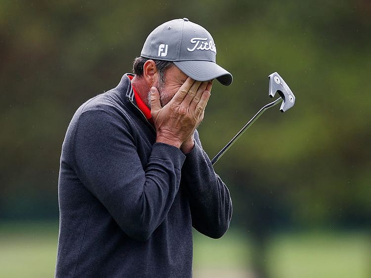 England's Richard Bland celebrates winning the British Masters 