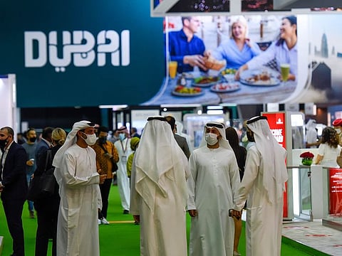 Visitors at the Dubai pavilion on the opening day of Arabian Travel Market 2021 at Dubai World Trade Centre.