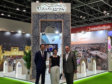  Michel Noblet, Executive Chairman of ATECA Holding with Sevara Madumarova from Ministry of Tourism and Sports of The Republic of Uzbekistan and Otabek Fazilbekov, Director of Financial Planning, Sue Poytaxt Qurilish Va Xizmat at Uzbekistan's Stand at the Arabian Travel Market