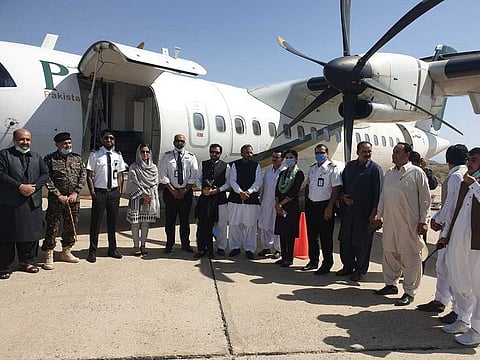 PIA flight from Karachi after landing at Zhob Airport.