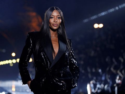 Naomi Campbell presents a creation by designer Anthony Vaccarello as part of his Spring/Summer 2020 women's ready-to-wear collection show for fashion house Saint Laurent during Paris Fashion Week in Paris, France, September 24, 2019.
