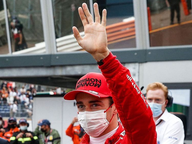 Ferrari's Monaco driver Charles Leclerc celebrates pole position 
