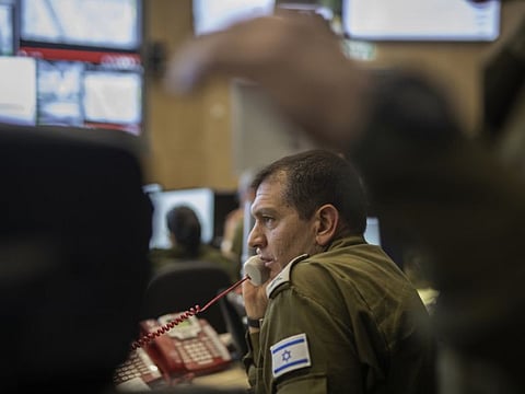 Maj. Gen. Aharon Haliva, the current director of operations for the Israeli military, speaks on a phone inside the Israeli Army’s underground command bunker in Tel Aviv, Israel, on Thursday, May 20, 2021. 