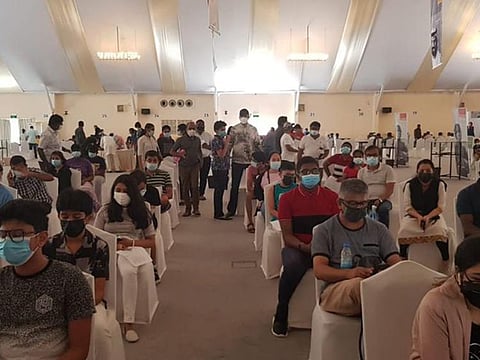 DPS Dubai students wait their turn to get the COVID-19 vaccine in Dubai