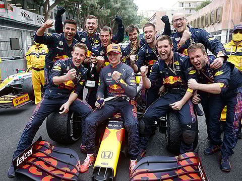 Red Bull driver Max Verstappen celebrates with his team after winning the Monaco Grand Prix 