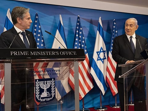 Secretary of State Antony Blinken, left, listens as Israeli Prime Minister Benjamin Netanyahu speaks during a joint statement after a meeting at the Prime Minister's office, Tuesday, May 25, 2021, in Jerusalem, Israel. 