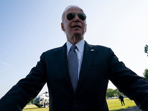 US President Joe Biden talks with reporters before boarding Marine One for a trip to Delaware, Tuesday, May 25, 2021, in Washington.