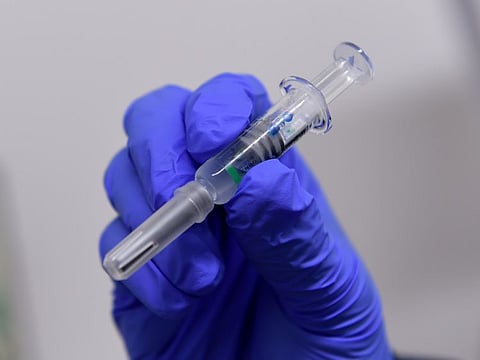 A nurse prepares a vaccine dose at Seha's COVID-19 vaccination centre in Mina Rashid, Abu Dhabi.