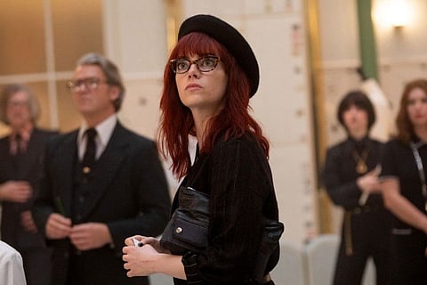 Emma Stone as the young title character (then known as Estella) in the origin story “Cruella.”