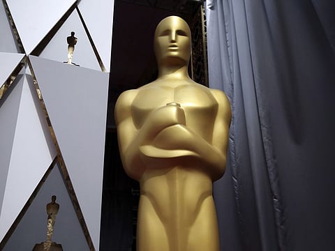 An Oscar statue along the red carpet area during preparations for the Academy Awards in Los Angeles, Feb. 27, 2016.