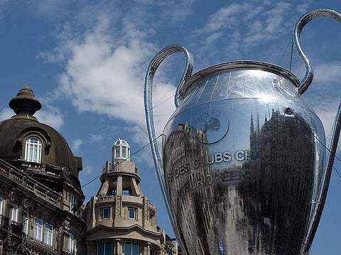 A giant inflatable replica of the Uefa Champions League trophy sits on the Aliados avenue in Porto on the eve of the final between Manchester City and Chelsea on Saturday.