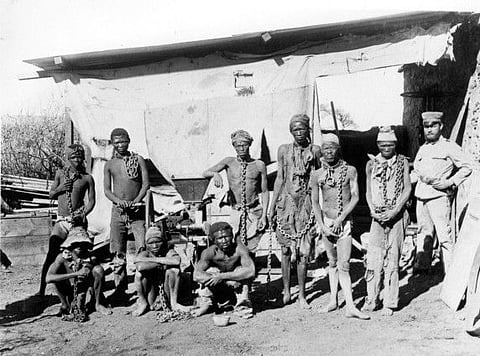This undated file photo taken during the 1904-1908 war of Germany against Herero and Nama in Namibia shows a soldier (right) probably belonging to the German troops supervising Namibian war prisoners. Germany on May 28, 2021 took a historic step by acknowledging that the massacre of Namibia's indigenous Herero and Nama peoples by colonial-era troops was an act of genocide. 