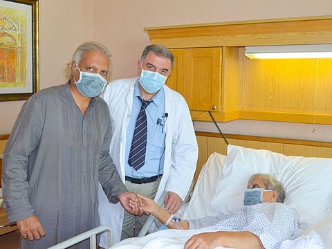 Dr Ehab Shehata with patient Saeeda Ahmed Wahab and her son Zia Ahmed at International Modern Hospital in Dubai. 