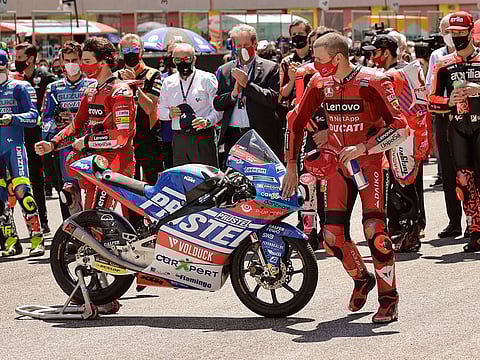 Ducati Lenovo Team's Jack Miller pays his respects to Moto3 rider Jason Dupasquier who died from injuries sustained in qualifying at Mugello ahead of the Italian Grand Prix