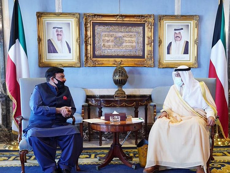 Minister for Interior Sheikh Rasheed Ahmed (L) meets Kuwaiti Prime Minister Sabah Al-Khalid Al-Sabah