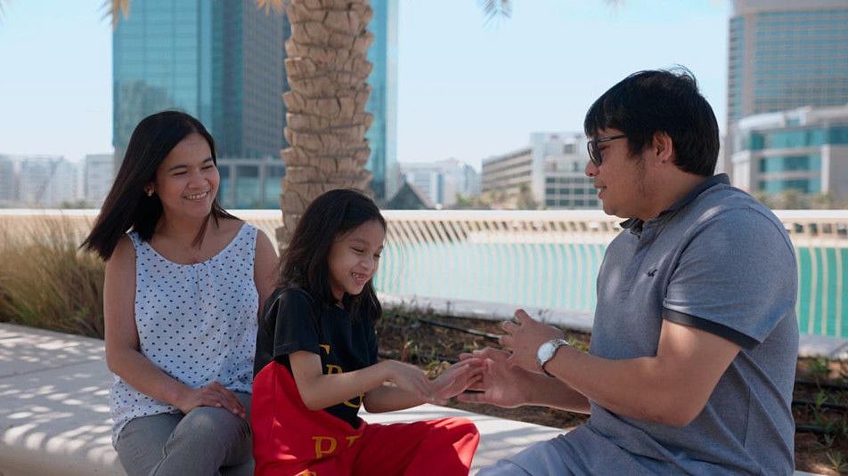 Daina Bautista with family-1622543982421
