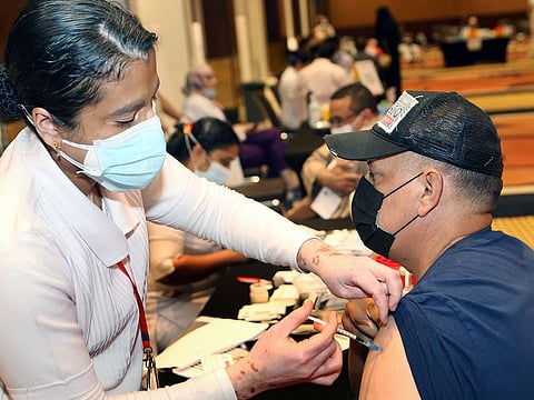 An Indian health worker administers a dose of the COVID-19 vaccine in Kuwait City in a file picture. The newcomers will arrive in Kuwait under a deal struck by the Kuwaiti private health sector two years ago, but was stymied over the COVID-19 outbreak, Al Rai said, citing Indian Ambassador to Kuwait Sibi George. 