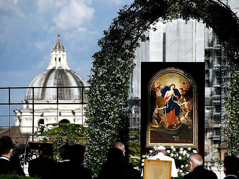 Pope Francis leads the prayer to mark the end of the month of worldwide prayers to stop the pandemic in the Vatican gardens Monday, May 31, 2021. 