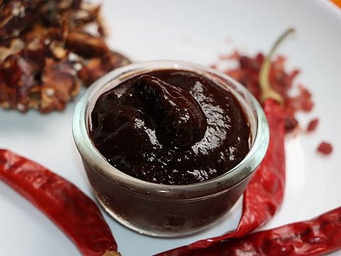 Imli Chutney: Sweet and tangy, with a hint of salt