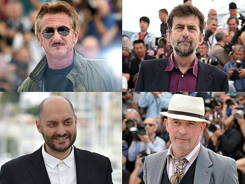 This combination of pictures created on June 3, 2021 shows four of the 24 film directors which will compete at the Cannes Film Festival from July 6 to 17, the organisers announced on June 3, 2021, (from Top left to bottom right) Sean Penn for his new film "Flag Day", Italy's Nanni Moretti with "Tri Piani", Russia's Kirill Serebrennikov with  "Petrov's Flu", and France's Jacques Audiard with "Les Oympiades".