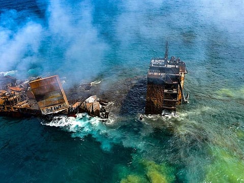 Smoke rises from a fire onboard the MV X-Press Pearl vessel as it sinks while being towed into deep sea off the Colombo Harbour, in Sri Lanka June 2, 2021. 