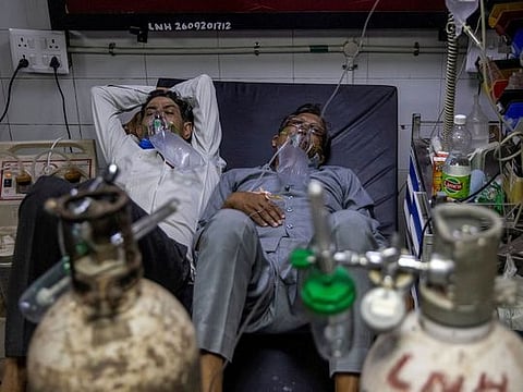 Photos: Witnessing COVID chaos in India's hospitals, graveyards and crematoriums