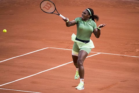 Serena Williams of the US plays a return to Danielle Collins in their third round match at the French Open tennis tournament at Roland Garros in Paris.